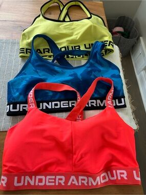 You get all 3! Under Armour Neon Yellow, Teal Blue & Bright Red Sports Bra!